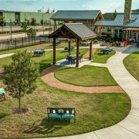 The essence of exceptional living outdoor green area with a building in the background