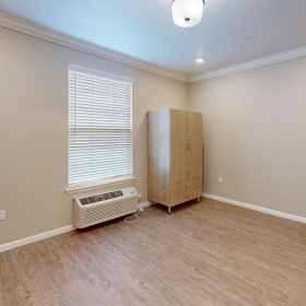 The essence of exceptional living a room with a wood floor and a wood cabinet