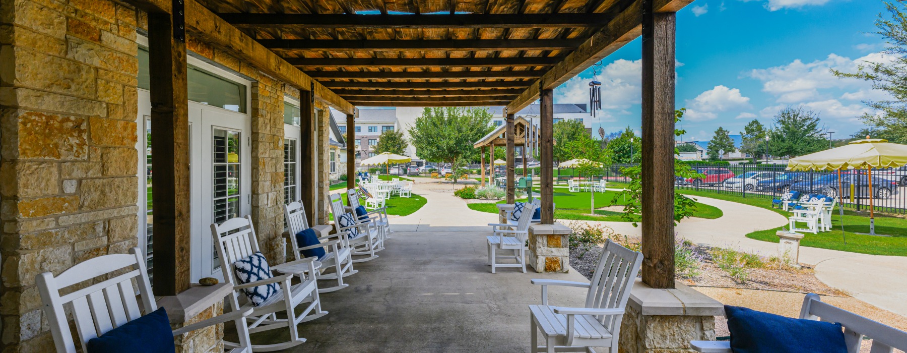 Patio with rocking chairs and benches
